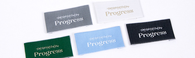 Etichette da cucire "Perfection Progress"